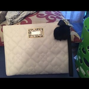 Betsey Johnson oversized cosmetic case.